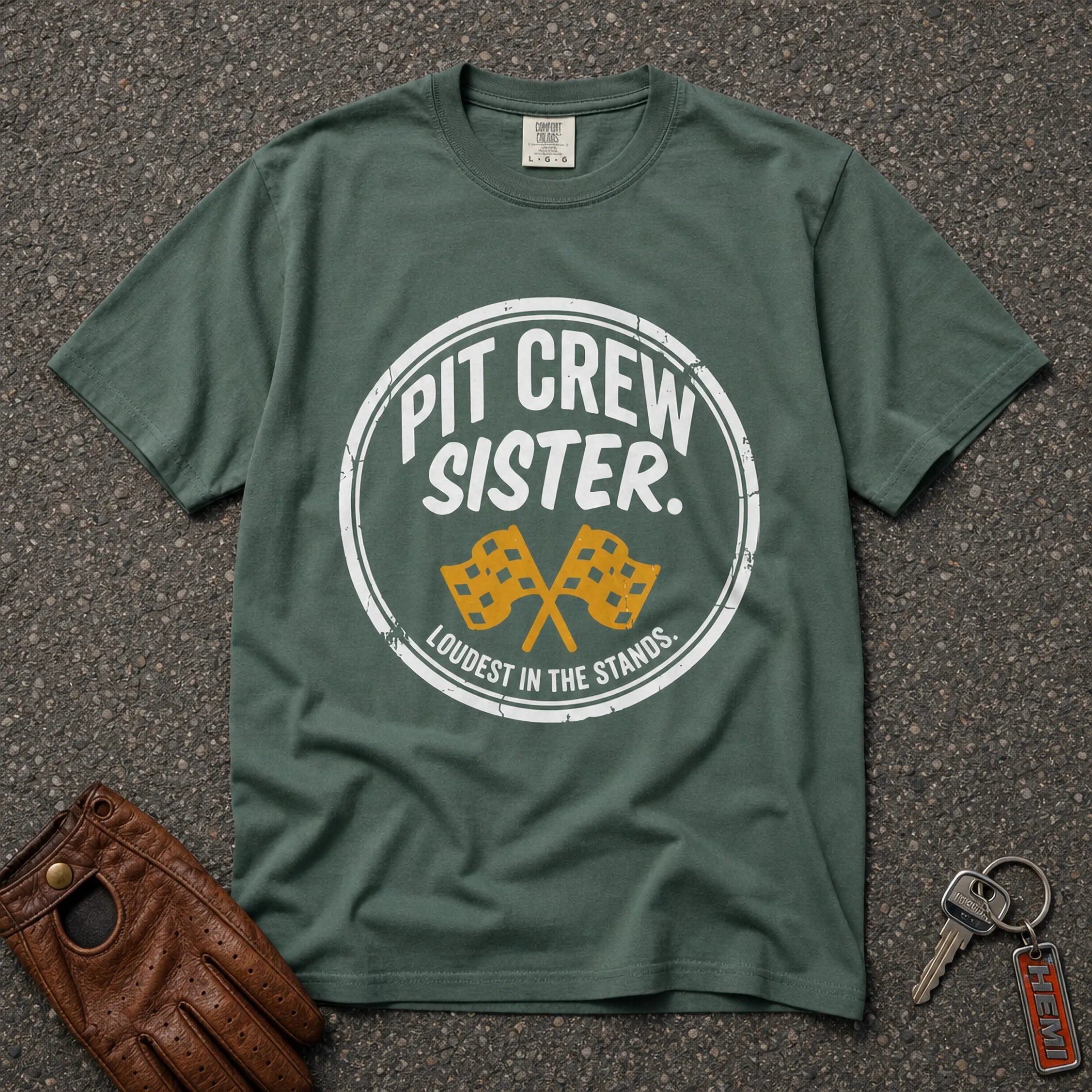 blue spruce pit crew racing graphic tee on hanger — vintage badge design comfort colors shirt