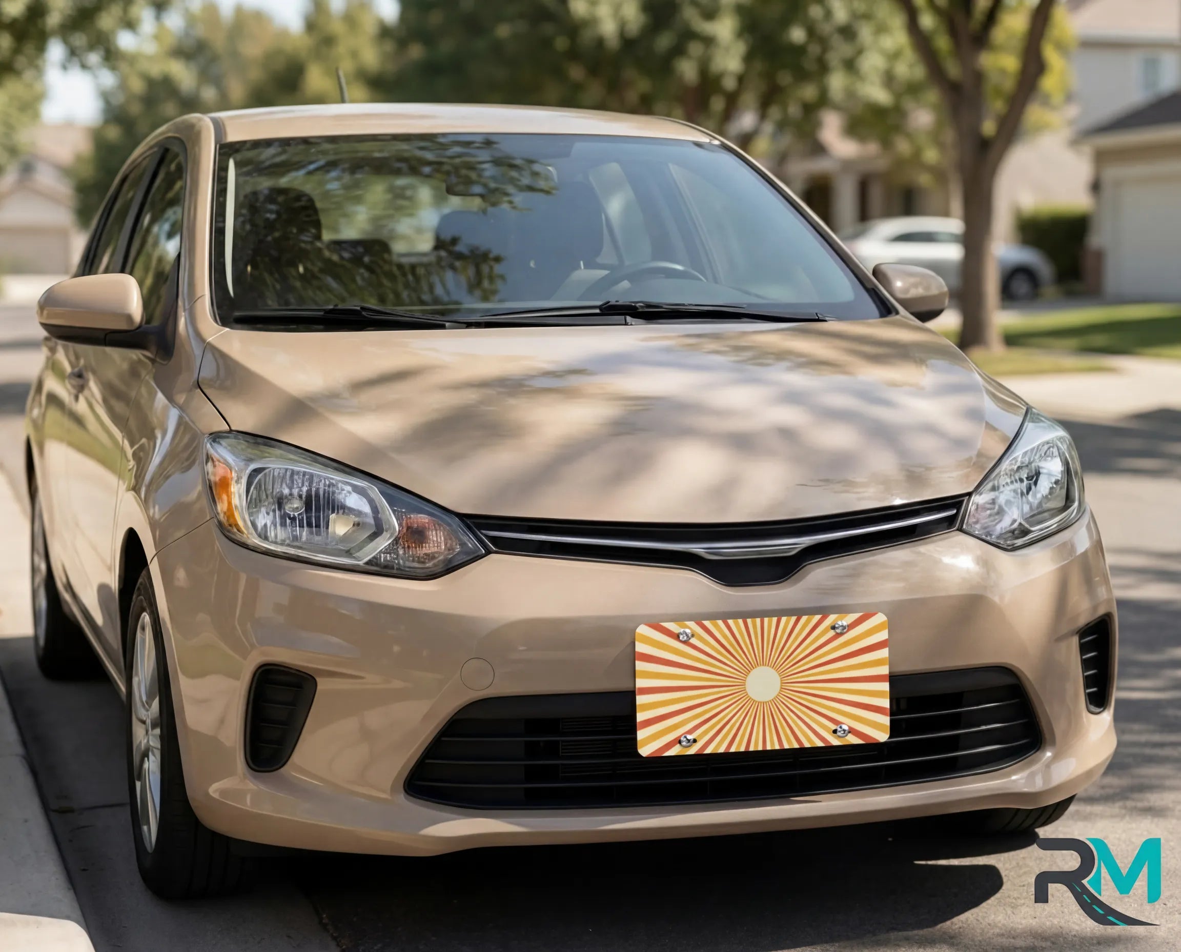 warm sunburst license plate on chocolate car — muted mustard peach front vanity plate