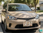 mama needs coffee vanity plate on chocolate car — neutral taupe cream front license plate