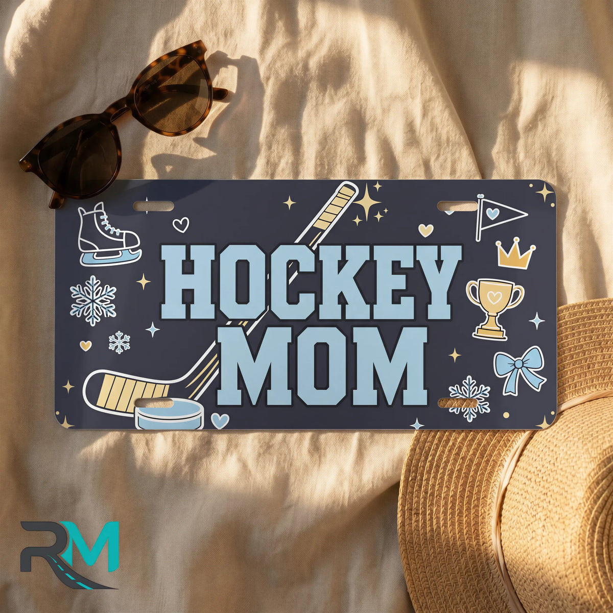 hockey mom license plate flat lay — deep navy hockey stick skate puck front plate