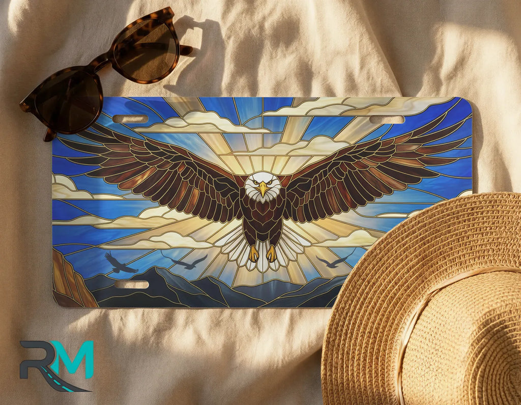 eagle license plate flat lay — stained glass cobalt gold soaring eagle front license plate