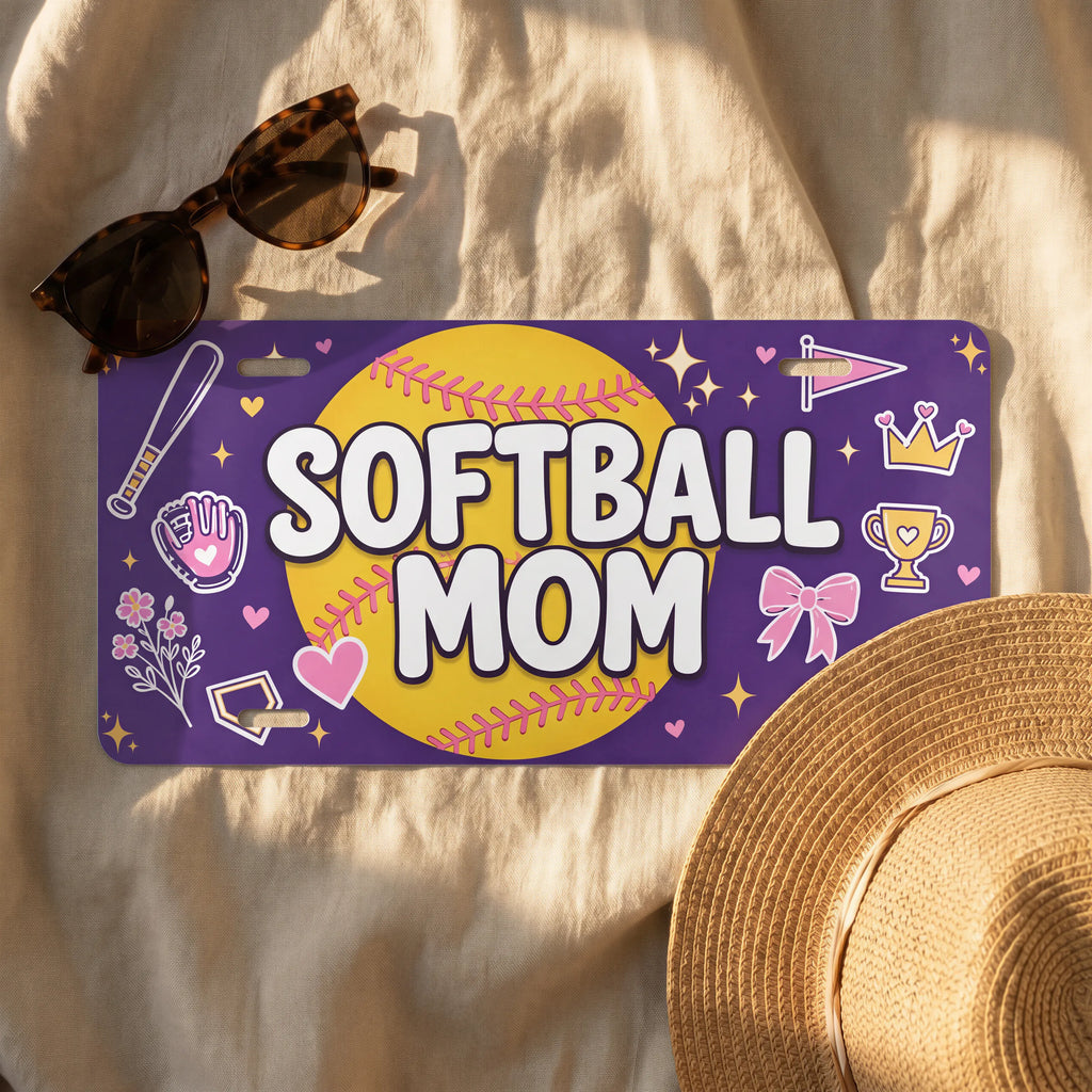 softball mom license plate flat lay — rich purple softball bat glove trophy front plate