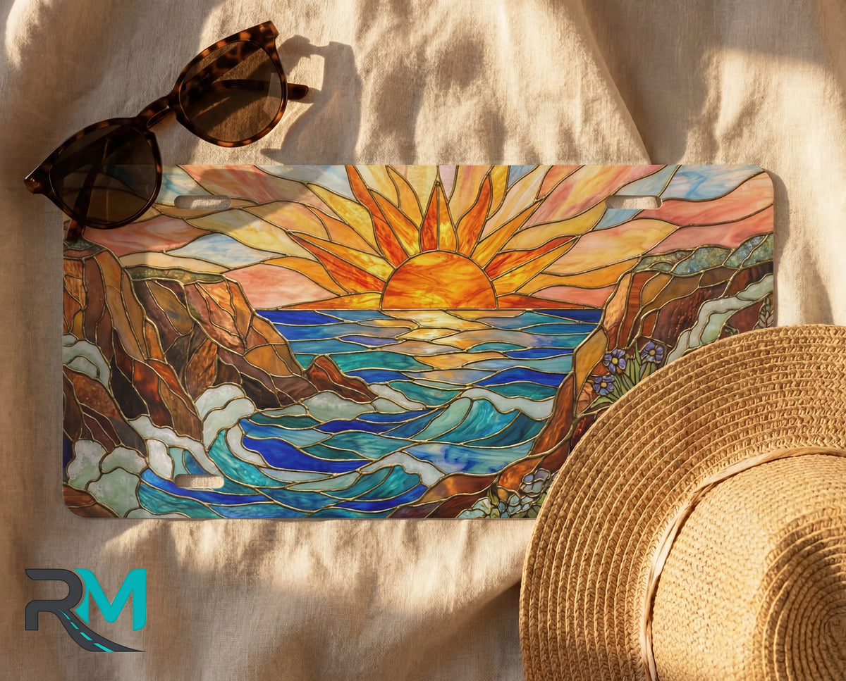 sunrise ocean cliffs license plate flat lay — warm sunrise orange gold wave cliffs wildflowers front plate
