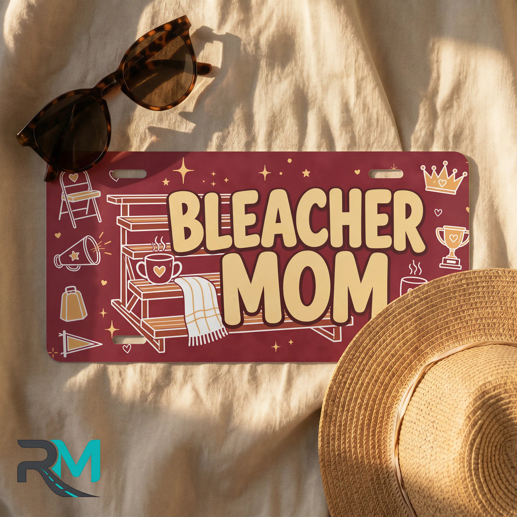 bleacher mom license plate flat lay — warm maroon chair megaphone coffee front plate
