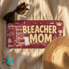 bleacher mom license plate flat lay — warm maroon chair megaphone coffee front plate