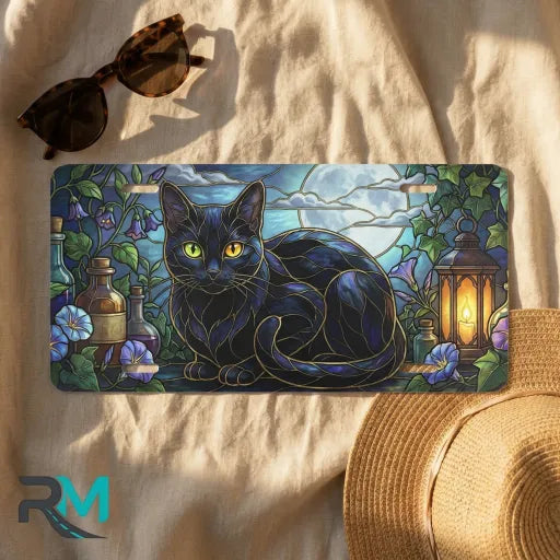 black cat stained glass license plate flat lay — jewel tone black cat moon lantern front plate
