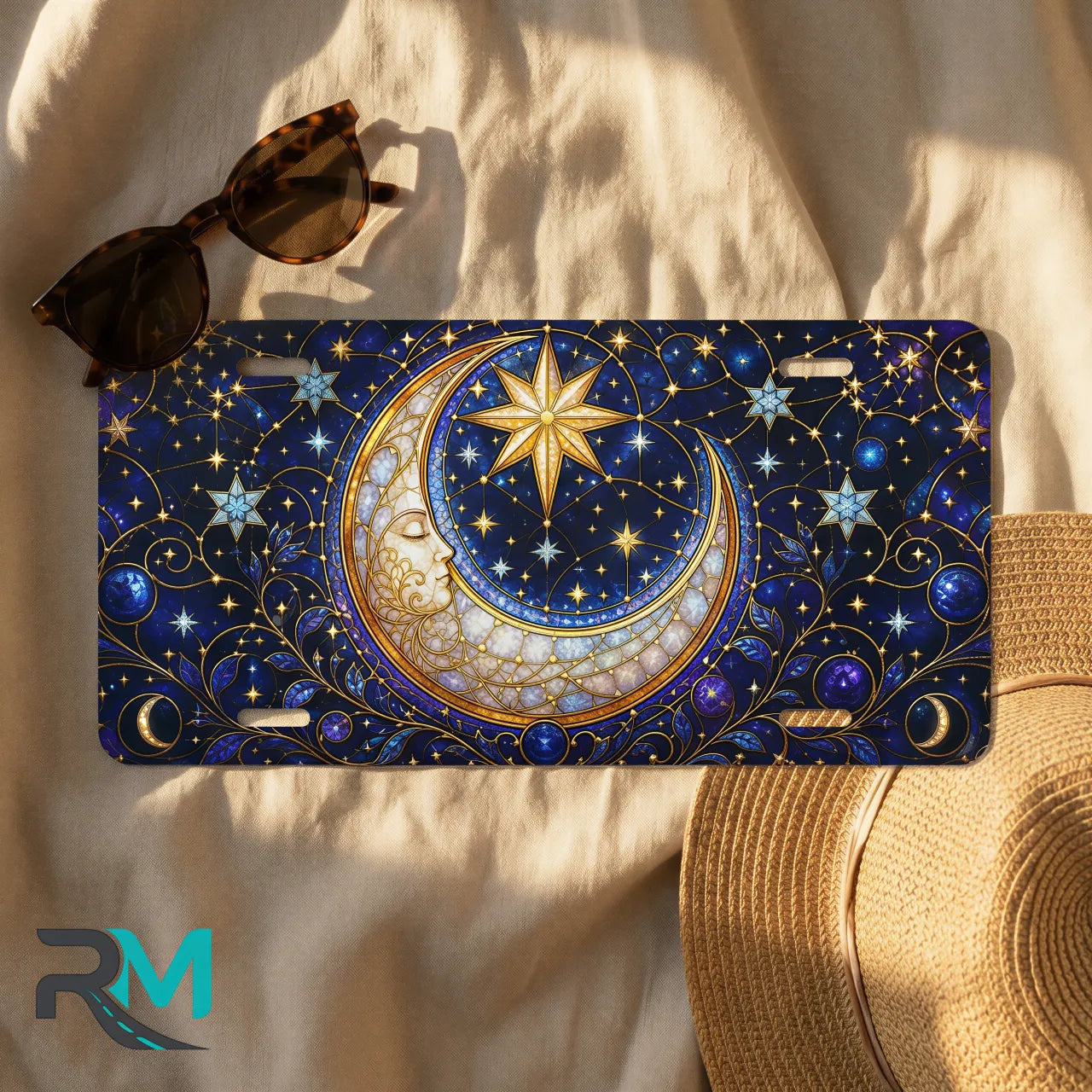 moon star license plate flat lay — deep indigo crescent moon gold stars front plate