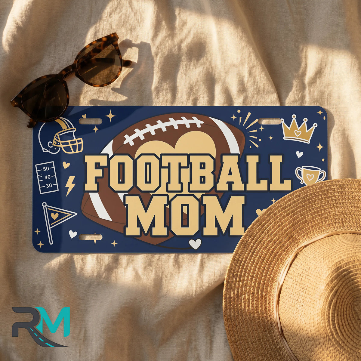 football mom license plate flat lay — deep navy football helmet pennant front plate