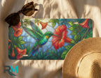 tropical hummingbird license plate flat lay — vivid red emerald blue bird front license plate
