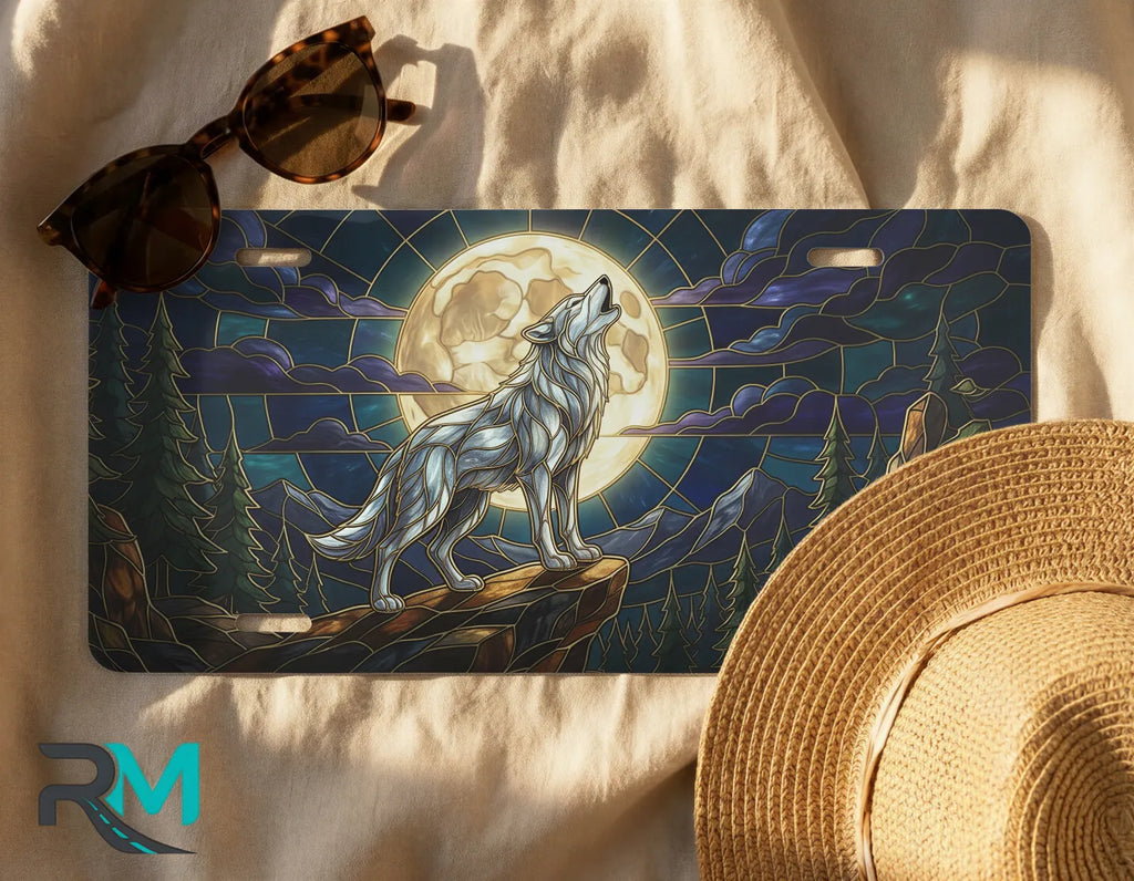 wolf moon license plate flat lay — midnight blue gold stained glass wolf front license plate