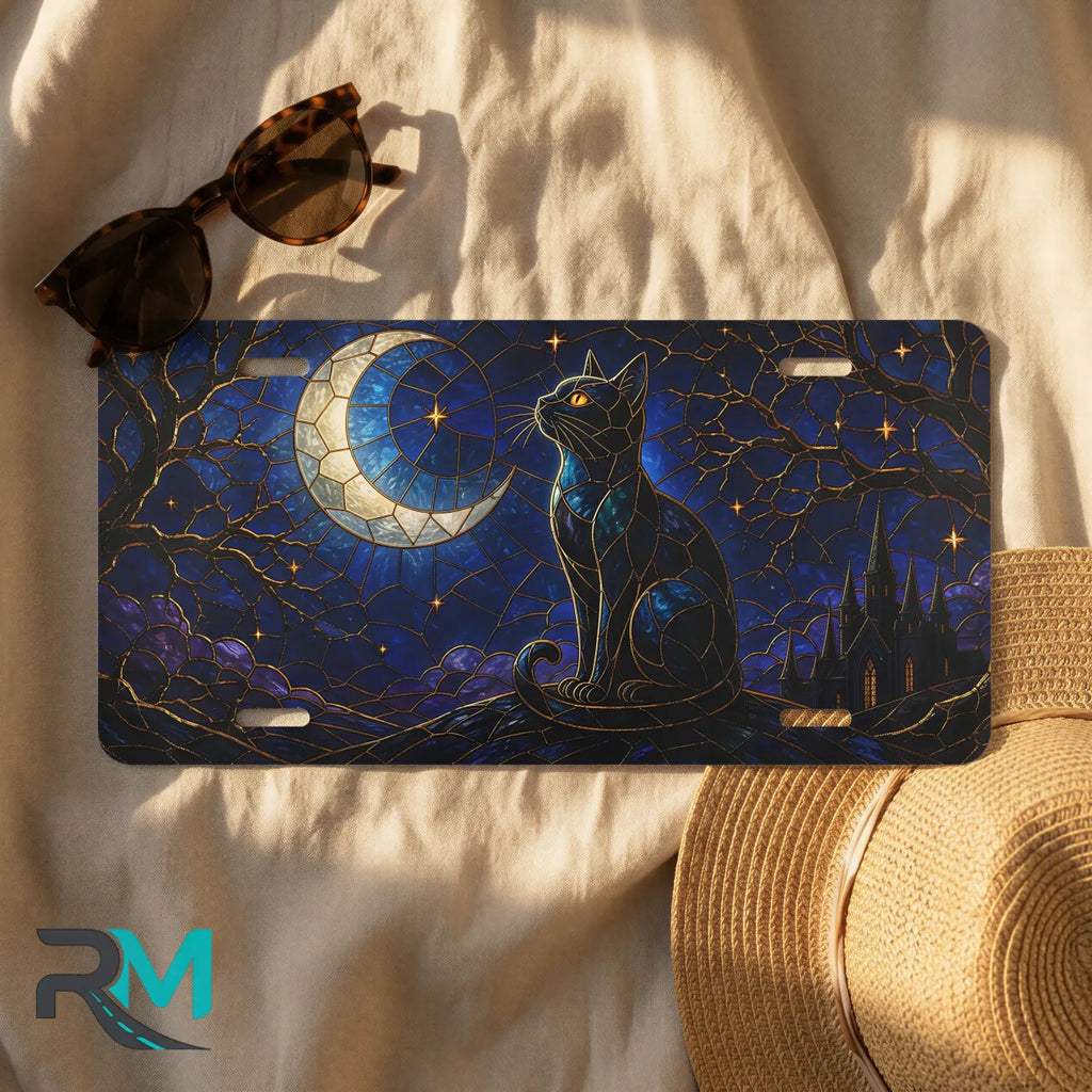 moonlit black cat license plate flat lay — deep indigo cobalt black cat crescent moon stars front plate