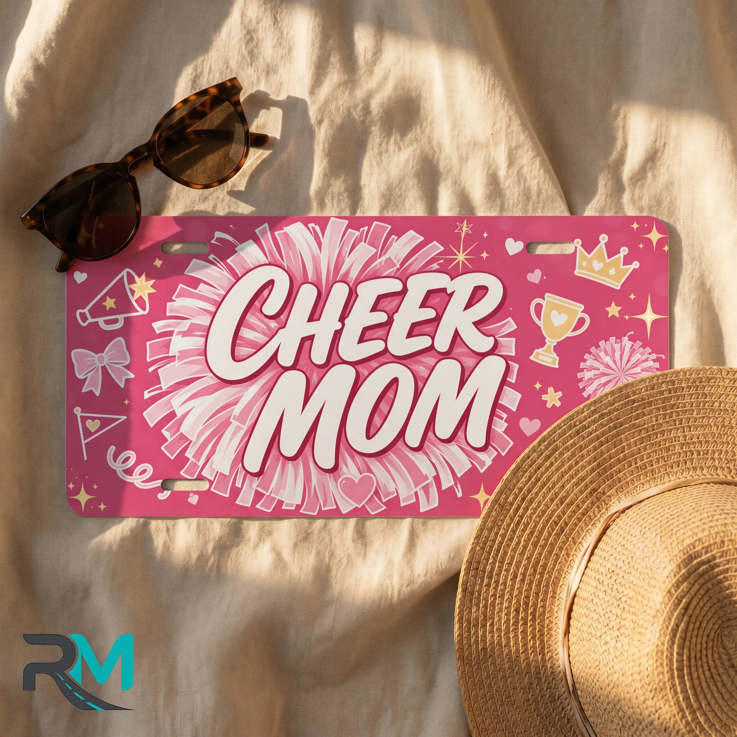cheer mom license plate flat lay — hot pink pom-pom bow trophy front plate