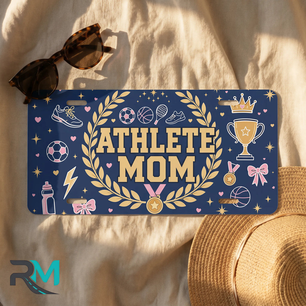 athlete mom license plate flat lay — deep navy gold laurel soccer trophy front plate