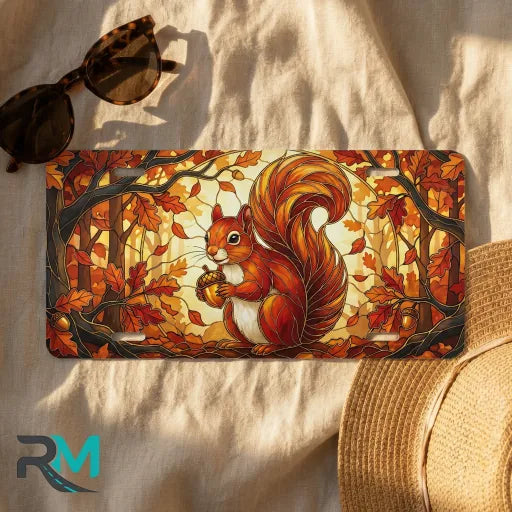 autumn squirrel license plate flat lay — warm amber squirrel acorn autumn leaves front plate