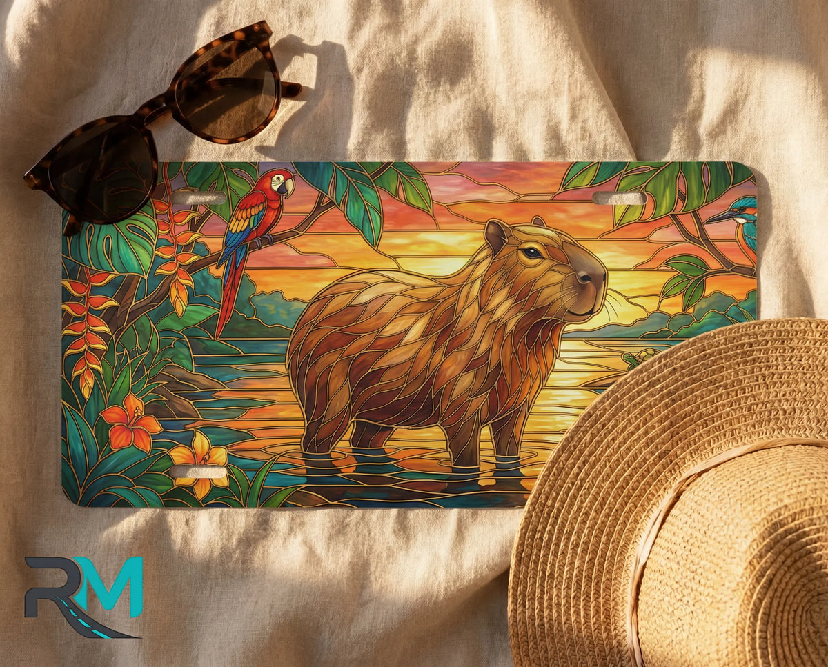 capybara sunset license plate flat lay — golden capybara wetland tropical parrot front plate