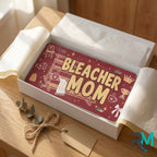 bleacher mom vanity plate as gift — maroon BLEACHER MOM license plate ready to give
