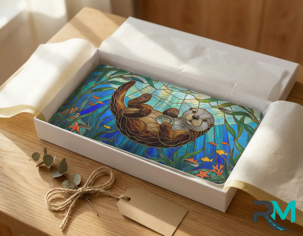 sea otter stained glass vanity plate as gift — jewel teal otter kelp license plate ready to give