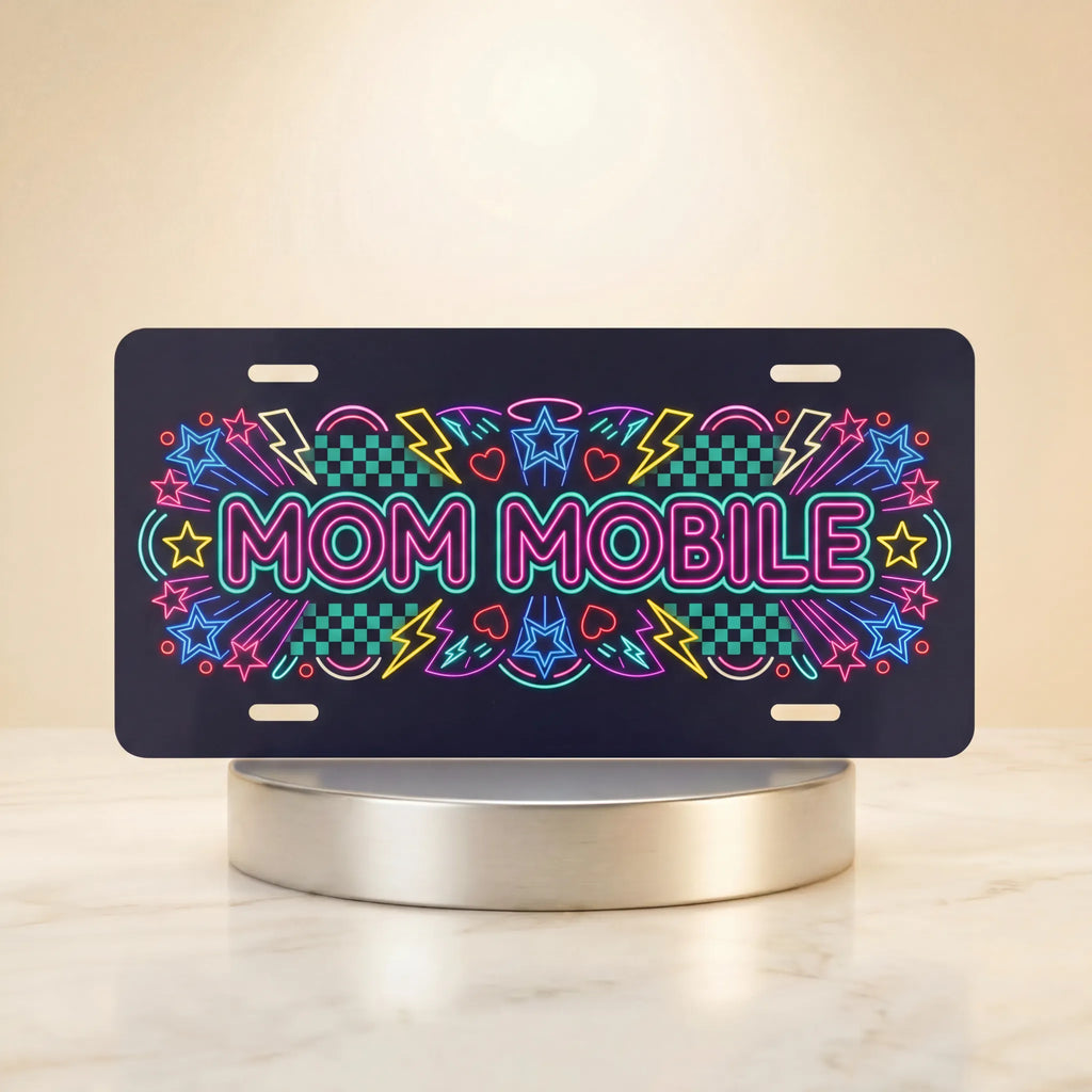 mom mobile vanity plate hero shot — bold neon pink electric blue yellow MOM MOBILE art