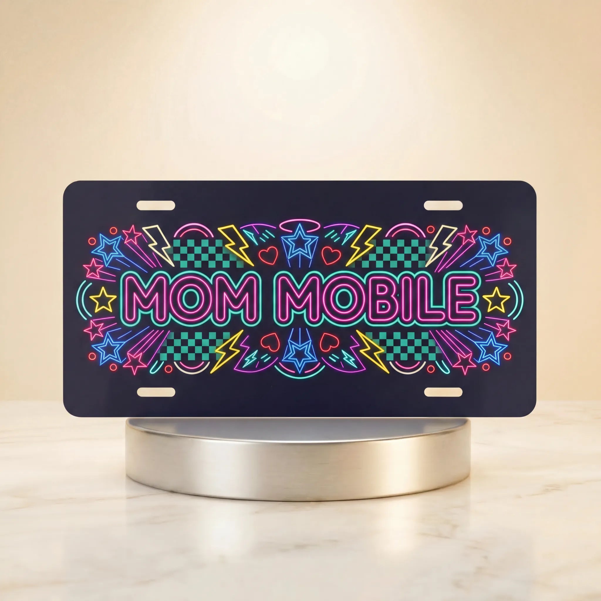 mom mobile vanity plate hero shot — bold neon pink electric blue yellow MOM MOBILE art