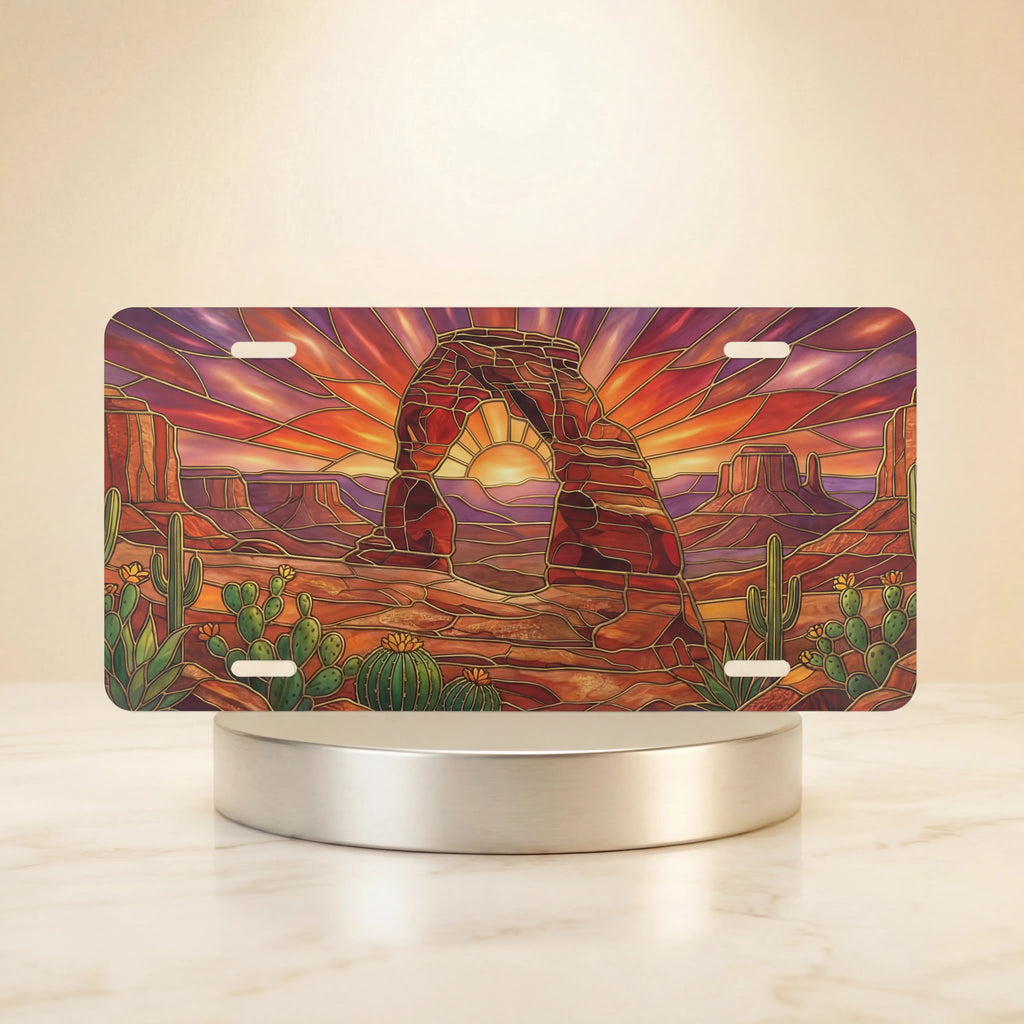 desert arch sunset cactus vanity plate — warm amber sandstone arch cactus burning sunset license plate on holder