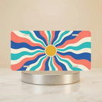 retro wavy sunburst vanity plate hero shot — vivid bright orange yellow wave art