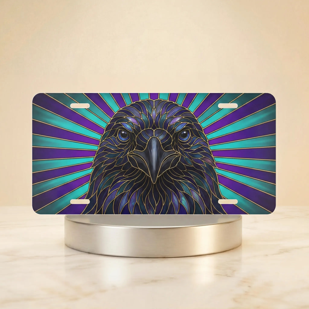 raven head vanity plate hero shot — deep sapphire violet teal bird radiant beams art