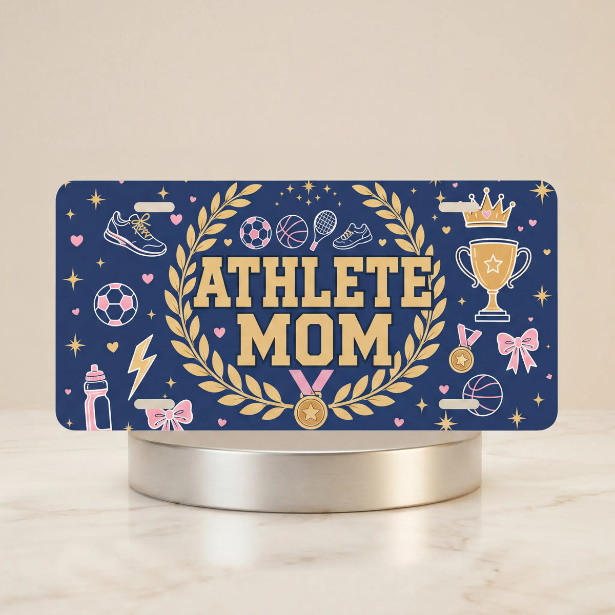 athlete mom vanity plate — deep navy gold laurel wreath soccer ball ATHLETE MOM license plate on holder