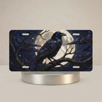 moonlit raven vanity plate hero shot — inky black raven luminous full moon midnight art