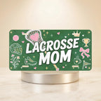 lacrosse mom vanity plate — deep green pink lacrosse sticks LACROSSE MOM license plate on holder