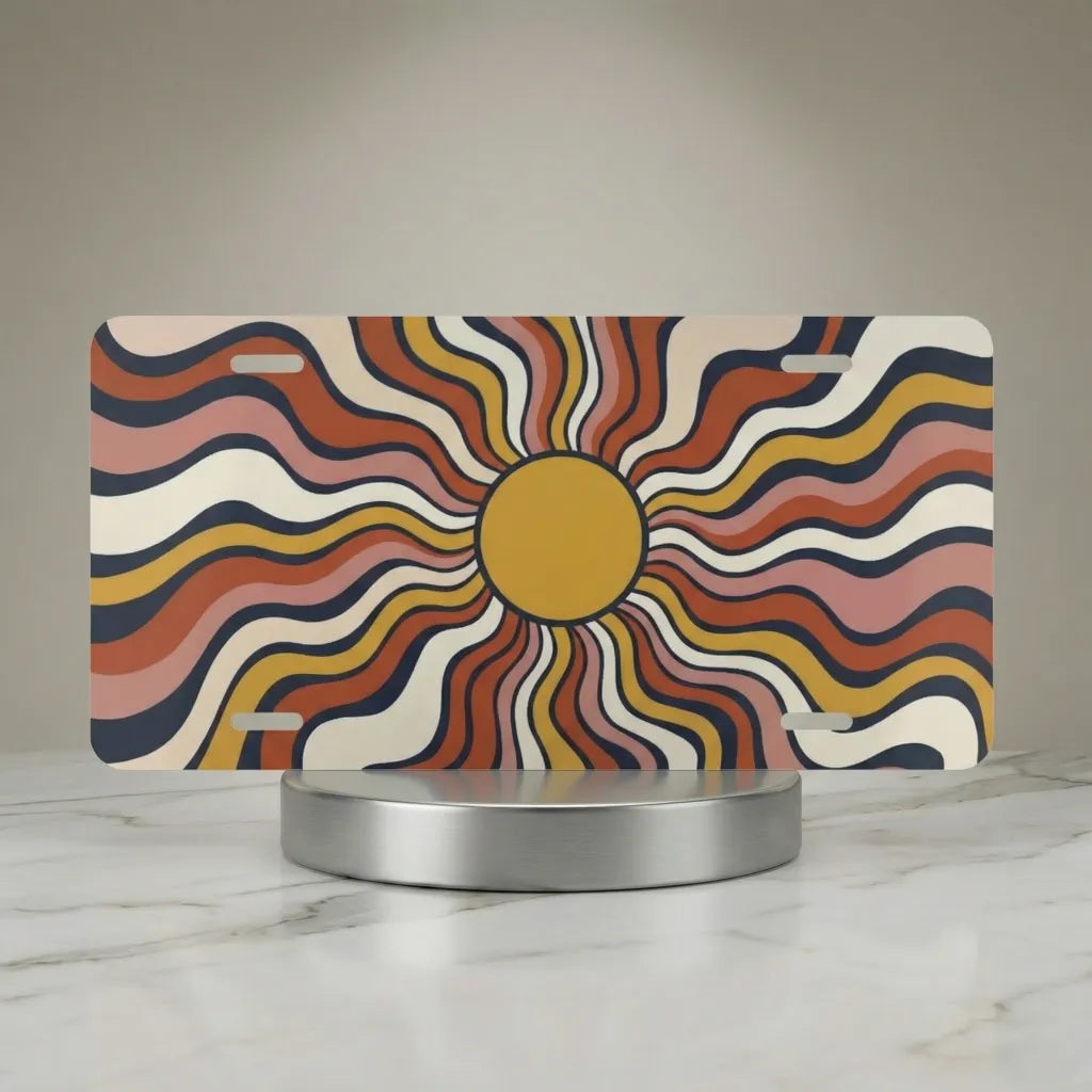 retro sun vanity plate hero shot — wavy hand-drawn rays orange mustard cream art