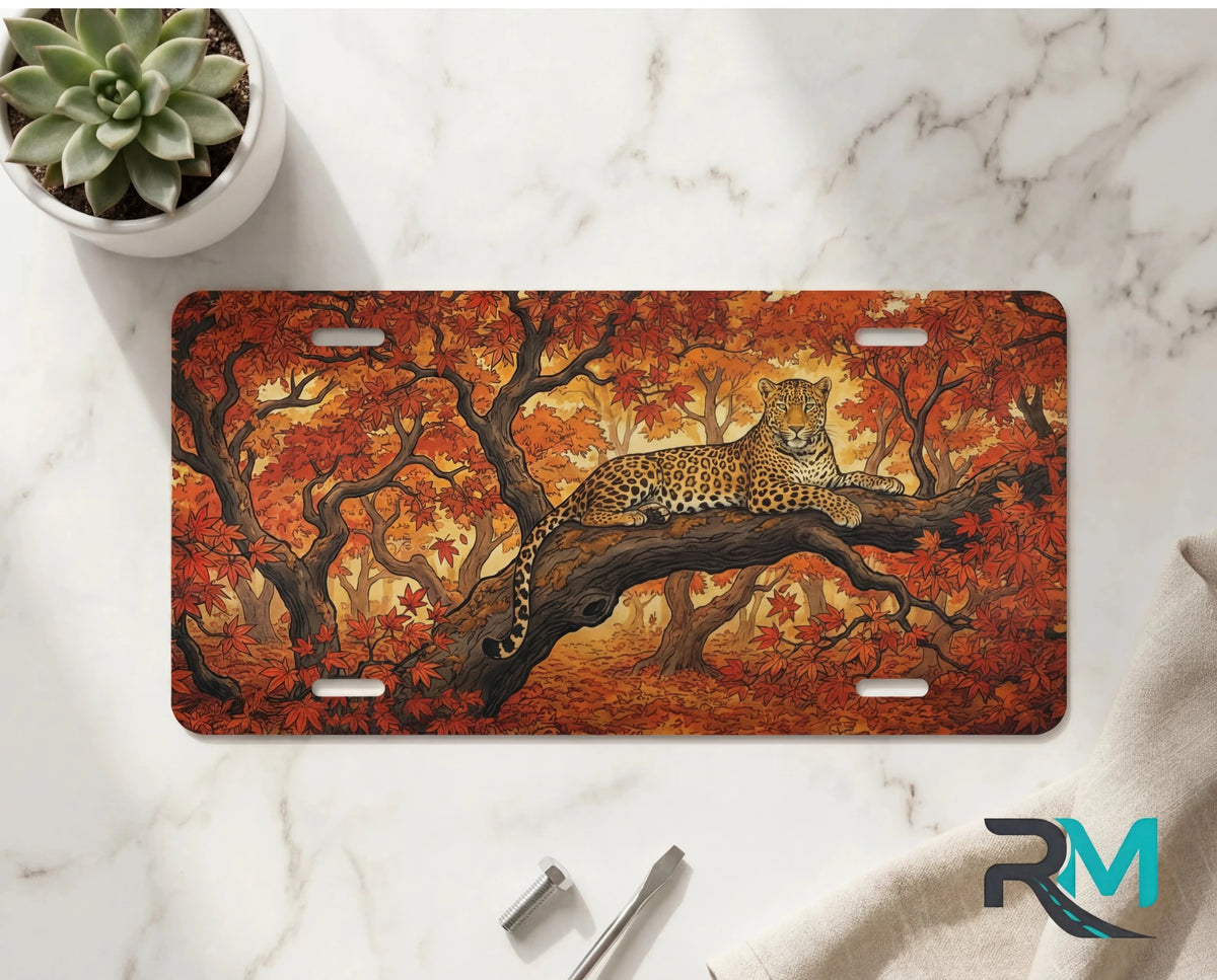 Leopard in Autumn Trees Vanity Plate - Road Muse