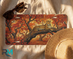 Leopard in Autumn Trees Vanity Plate - Road Muse