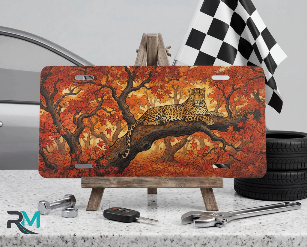 Leopard in Autumn Trees Vanity Plate - Road Muse