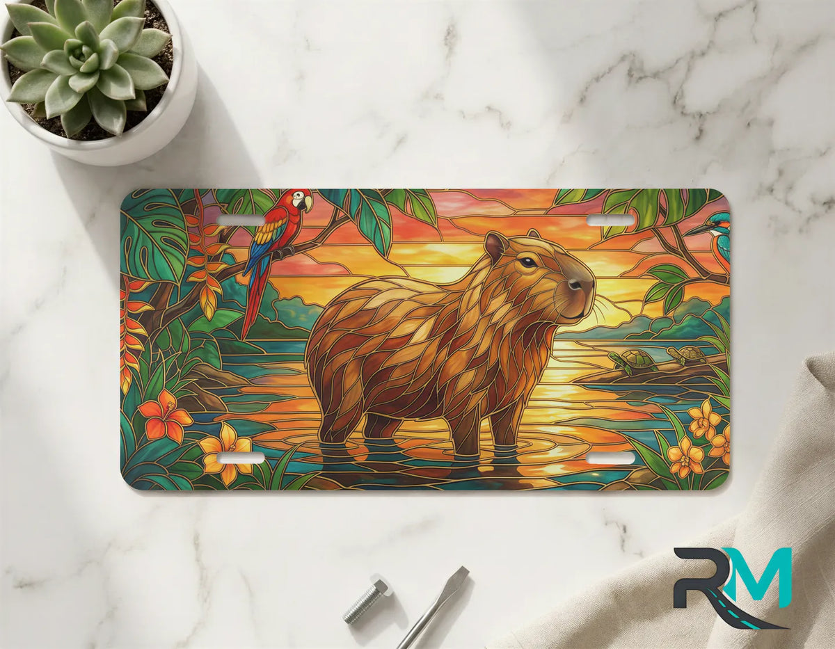 capybara sunset vanity plate on marble surface — golden capybara wetland tropical decorative plate