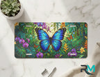 blue butterfly vanity plate on marble surface — vivid blue butterfly tropical foliage decorative plate