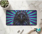 raven radiant rays vanity plate on marble surface — jewel-tone bird decorative license plate