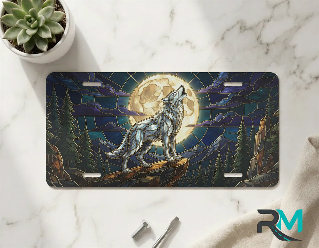 howling wolf moon vanity plate on marble surface — midnight jewel-tone decorative wolf plate