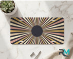 retro striped vanity plate on marble surface — terracotta mustard mid-century decorative plate