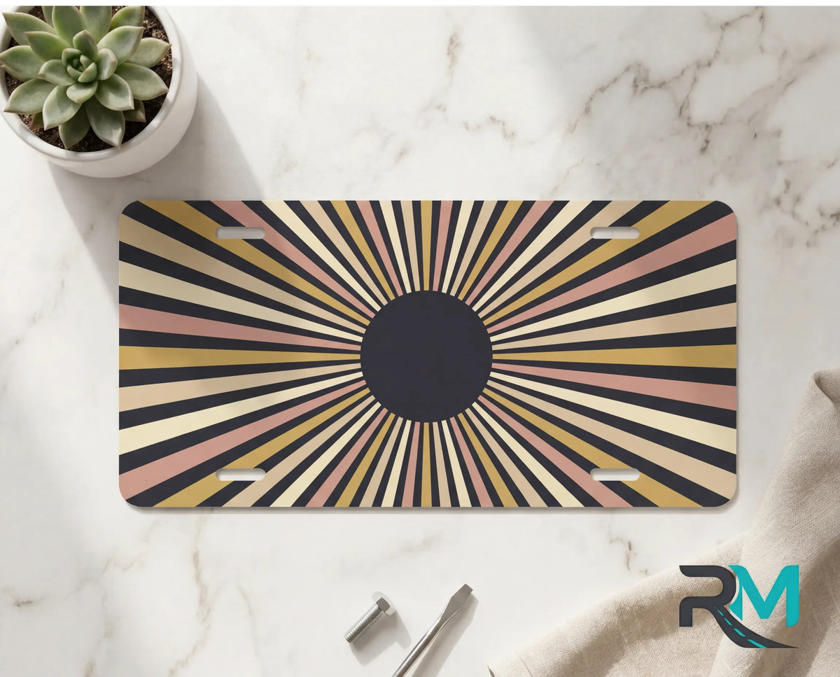retro striped vanity plate on marble surface — terracotta mustard mid-century decorative plate