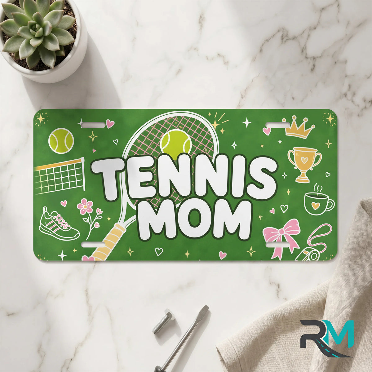 tennis mom vanity plate on marble surface — fresh green tennis racket decorative plate