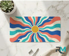 colorful wave vanity plate on marble surface — bright retro wavy sunburst decorative plate
