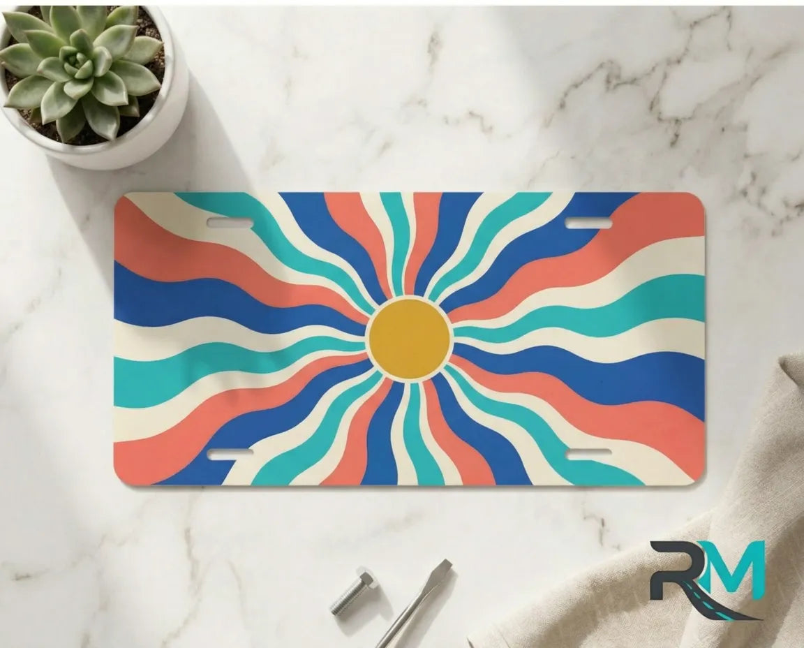 colorful wave vanity plate on marble surface — bright retro wavy sunburst decorative plate