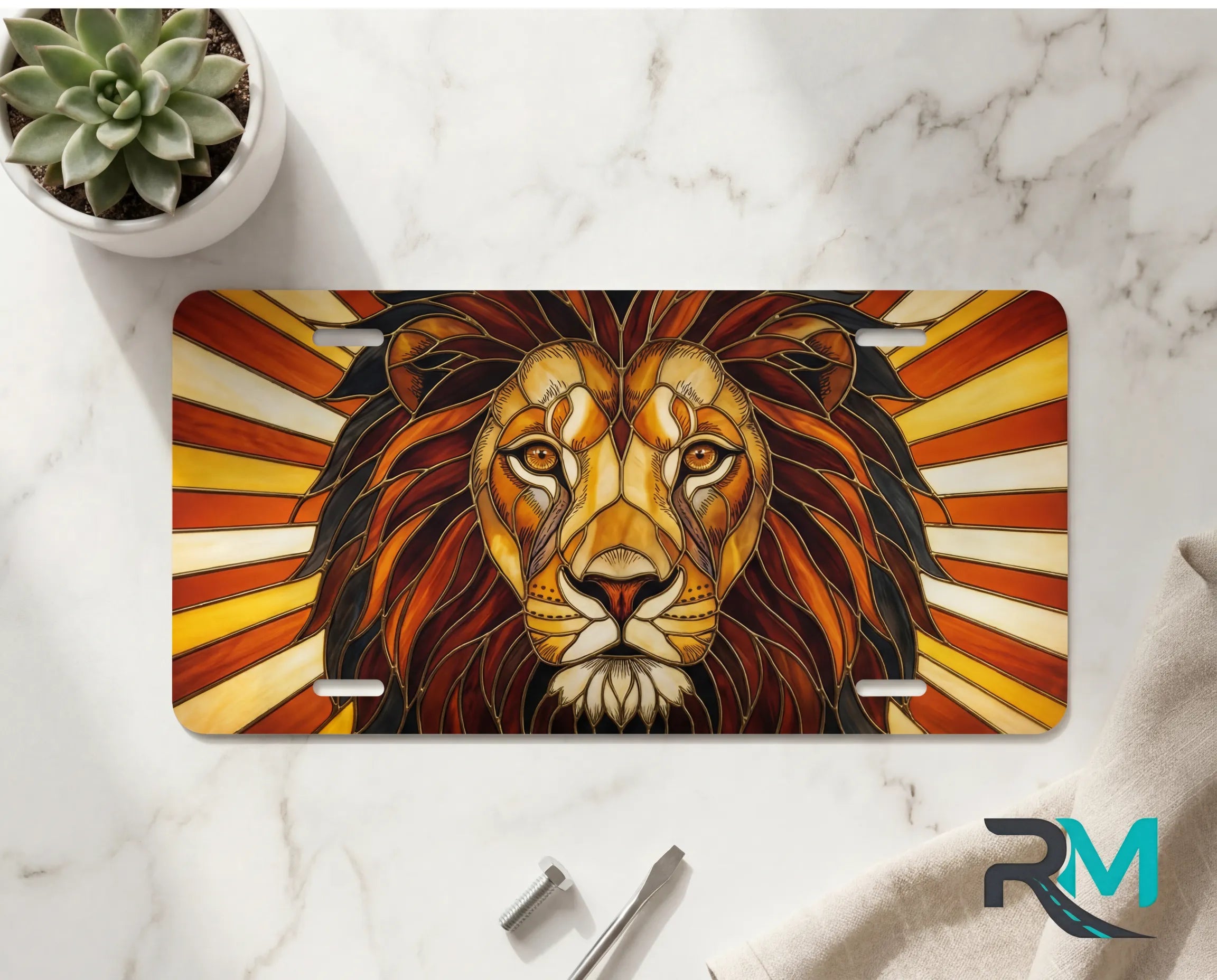 lion face vanity plate on marble surface — warm amber rust gold decorative lion plate