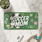 soccer mom vanity plate on marble surface — pink soccer ball green decorative license plate