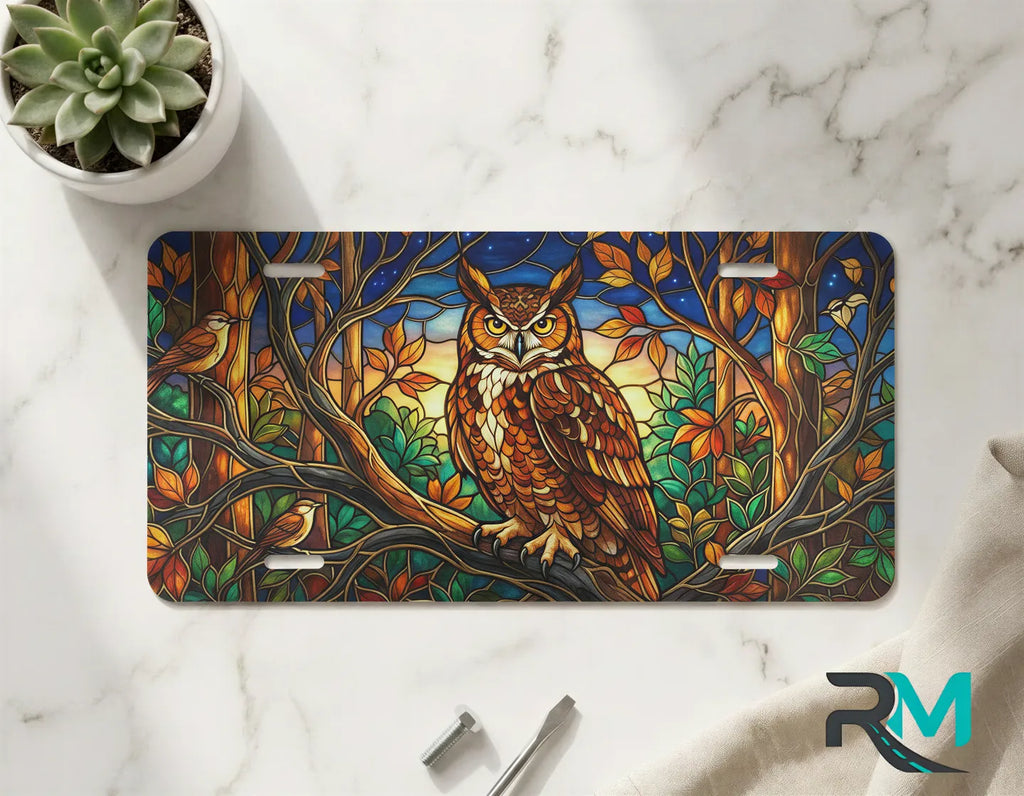 stained glass owl vanity plate on marble surface — amber forest green twilight decorative plate