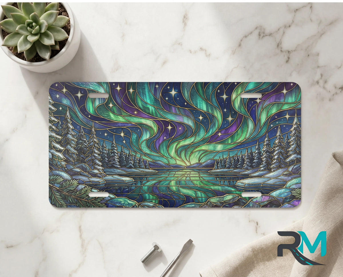 northern lights lake scene vanity plate on marble surface — jewel teal purple aurora frozen lake decorative plate