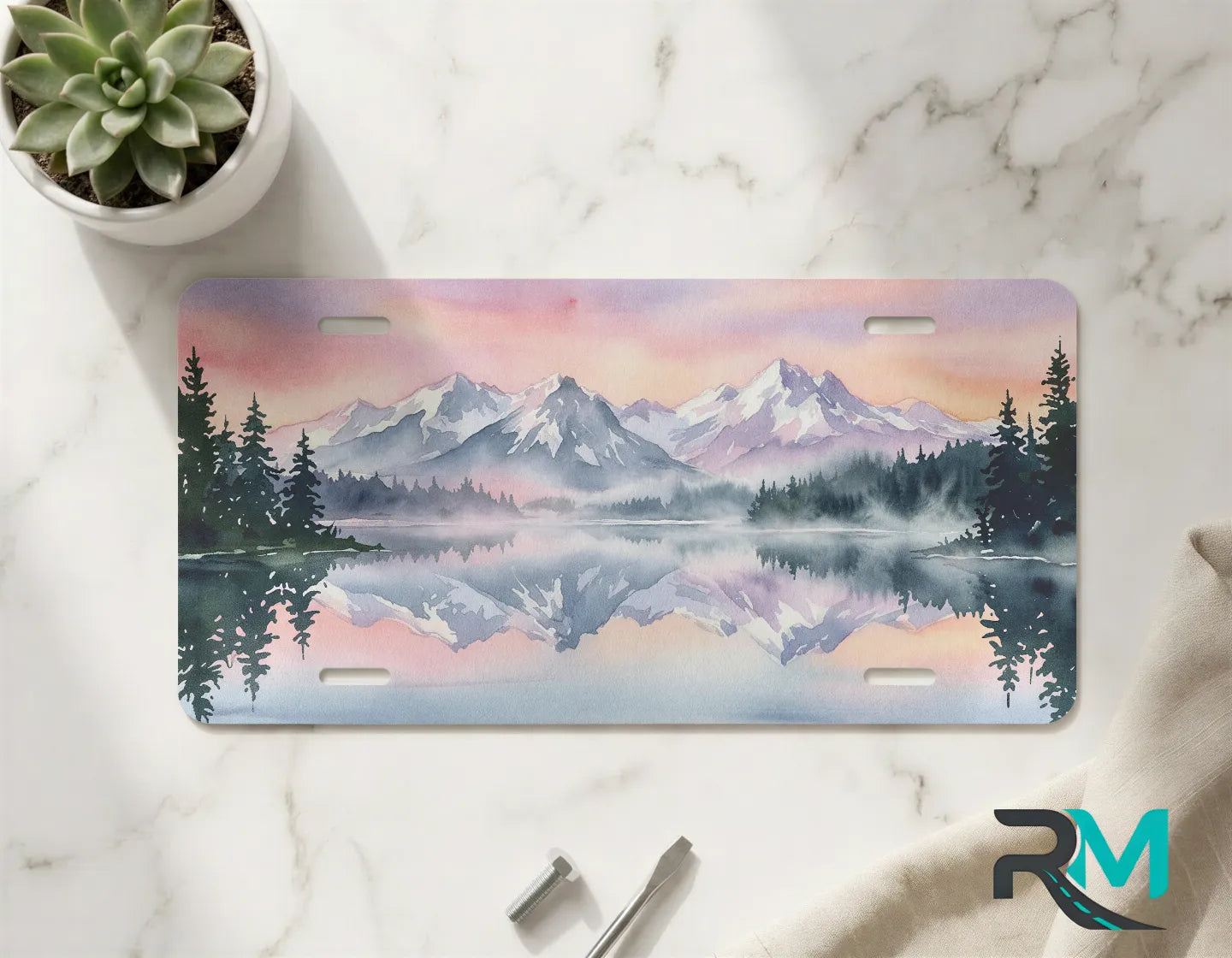 alpine lake vanity plate on marble surface — blush pink mist blue mountain watercolor art