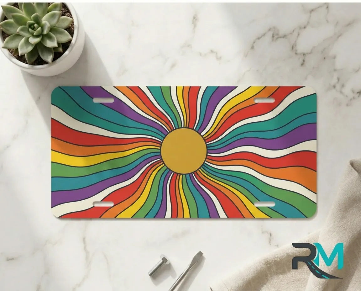 retro rainbow vanity plate on marble surface — vivid multicolor sunburst decorative plate