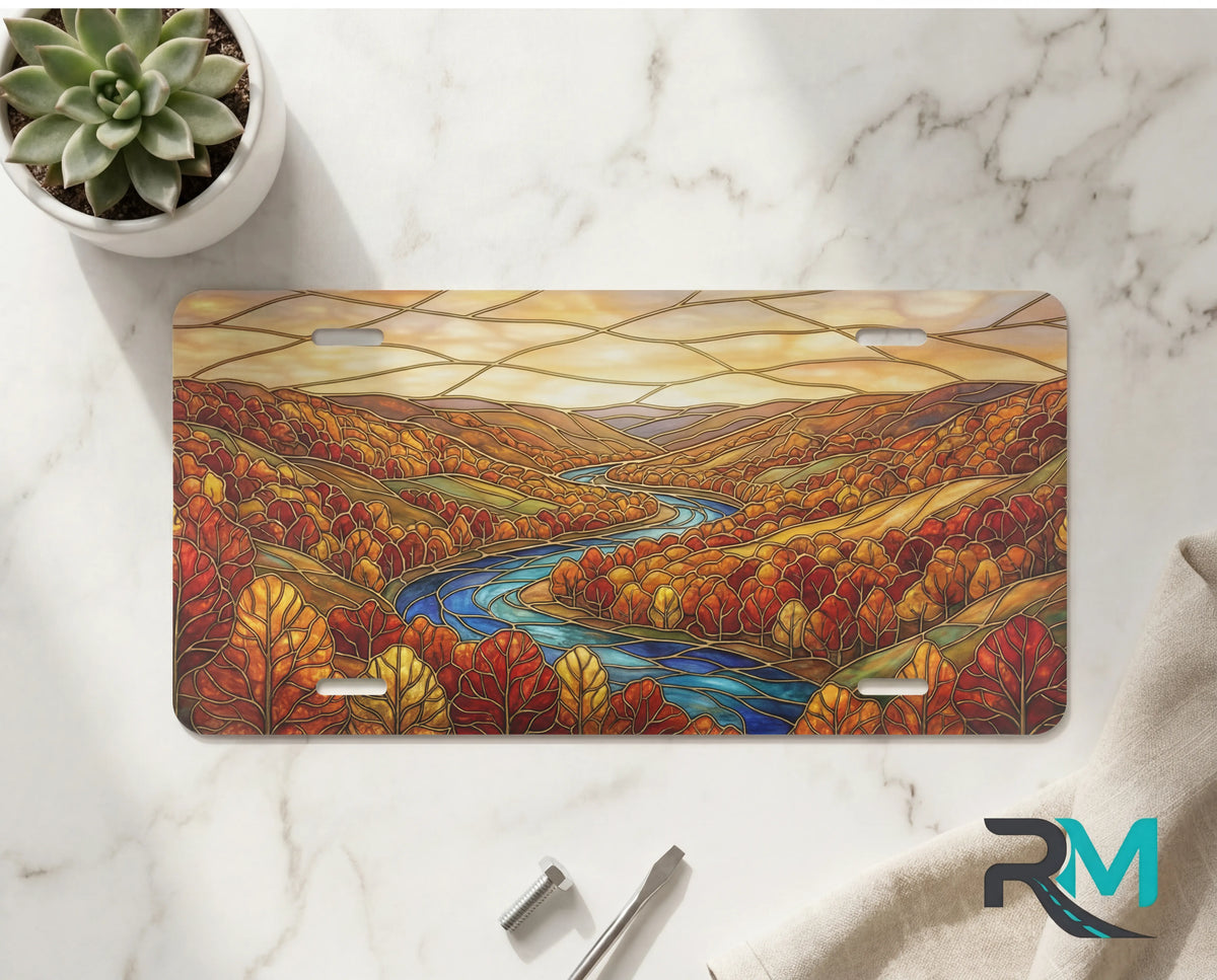 autumn river landscape vanity plate on marble surface — rich autumn red gold winding river decorative plate