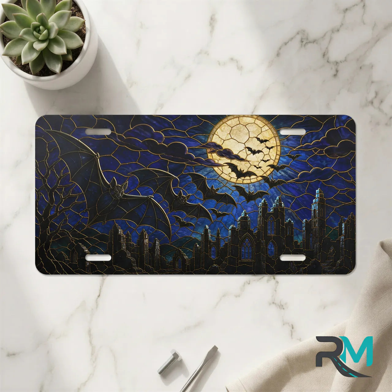 full moon bats vanity plate on marble surface — midnight blue bat cracked moon decorative plate